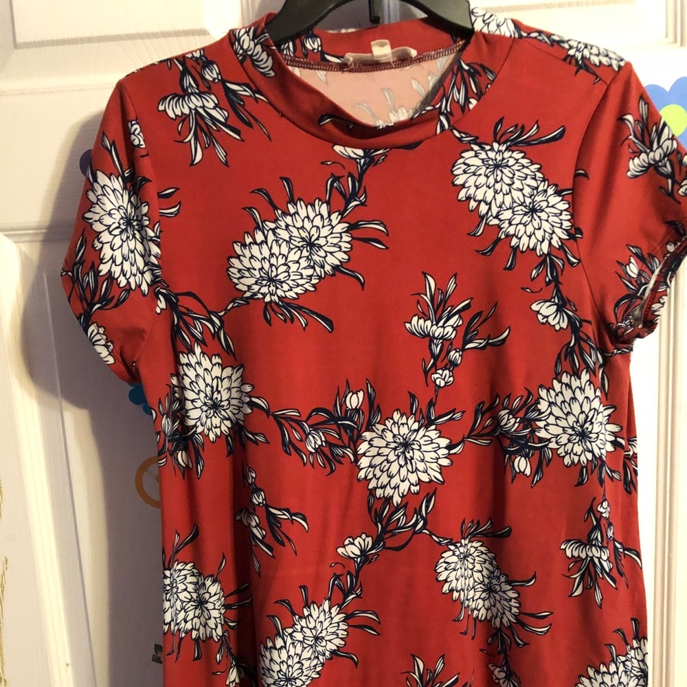 One black across the shoulder & one flower dress